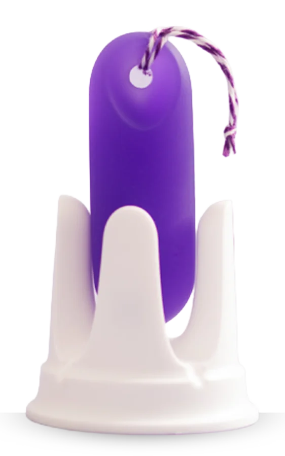 Close-up of the purple trackleCatch in its white mount.